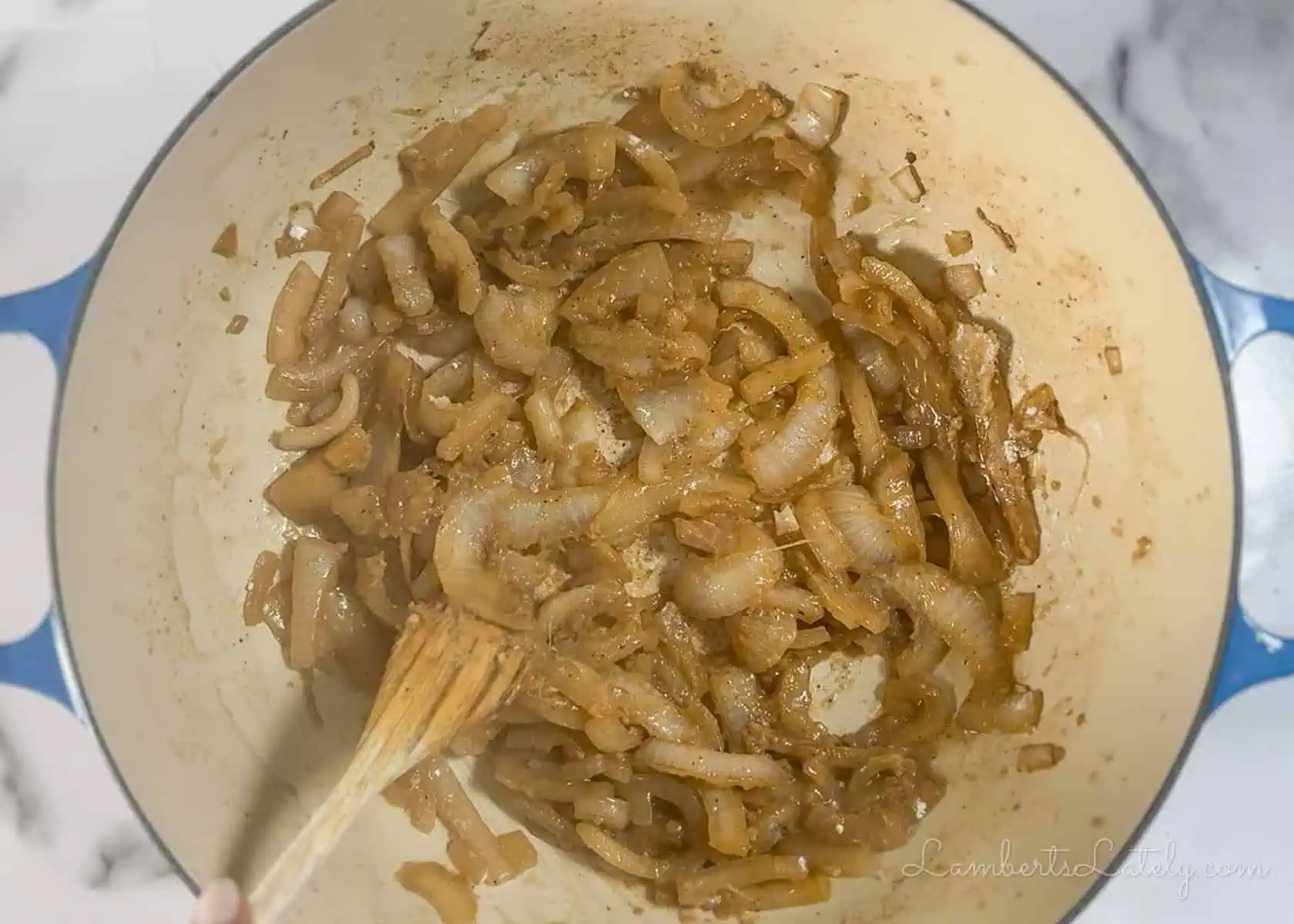 caramelizing onions in a cast iron pan.