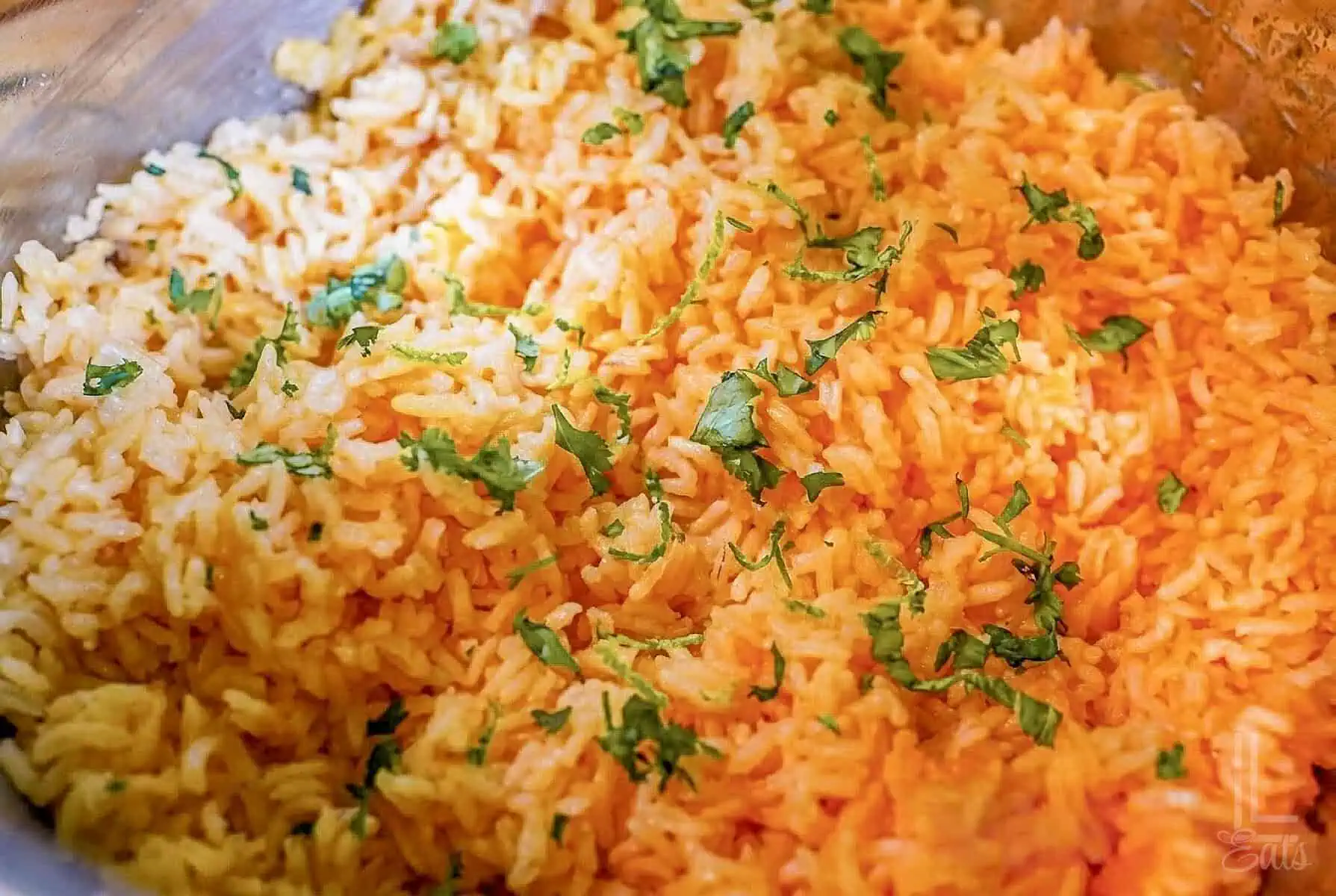 mexican rice in an instant pot, topped with chopped cilantro.