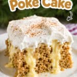 Eggnog poke cake with creamy filling and cinnamon topping on a white plate.