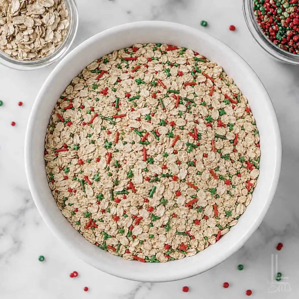 Reindeer food mixture with oats, red and green sprinkles for Christmas.
