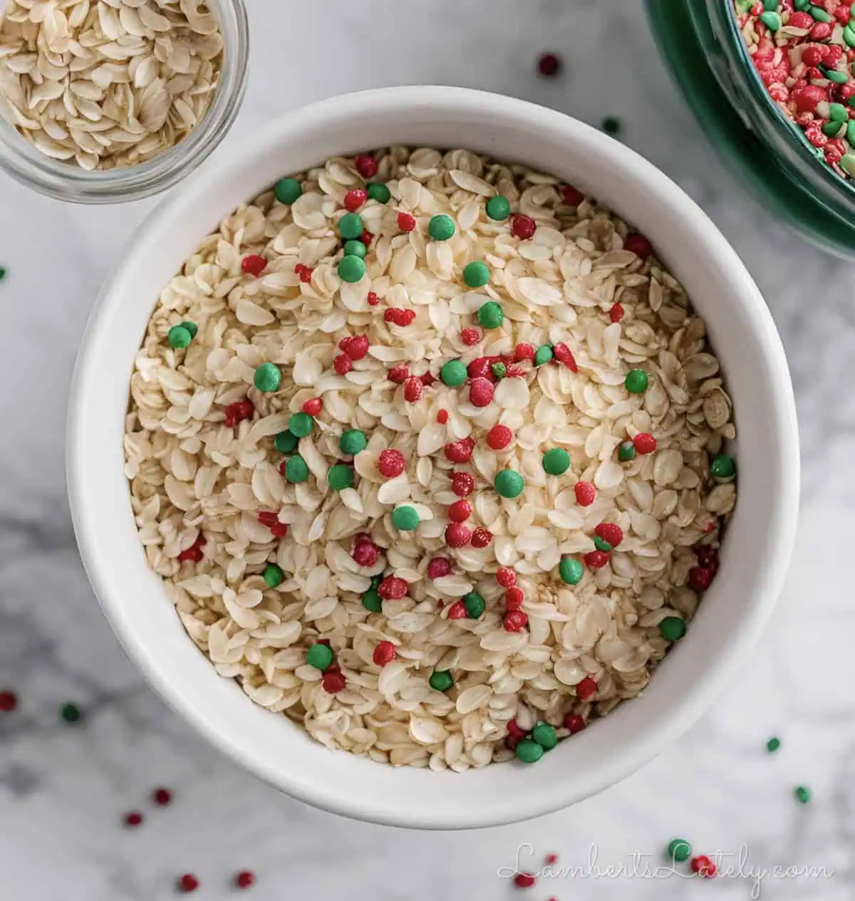 oats and red and green sprinkles in a bowl.