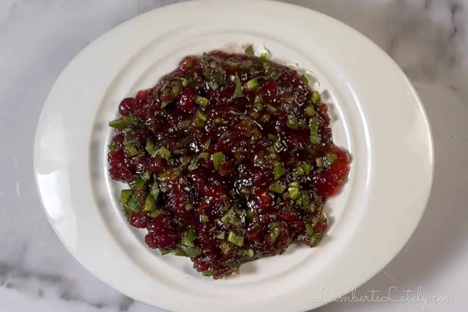 cranberry mixture poured over the cream cheese layer.
