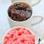 Two mugs with colorful microwave mug cakes, one chocolate and one strawberry, for a quick dessert.