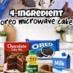 Close-up of Oreo mug cake with whipped cream and Oreo cookie topping on a white plate.