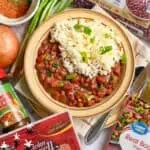 Delicious red beans and rice served with fresh green onions and spices.
