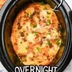CrockPot breakfast casserole topped with cheese and green onions, ready to serve.