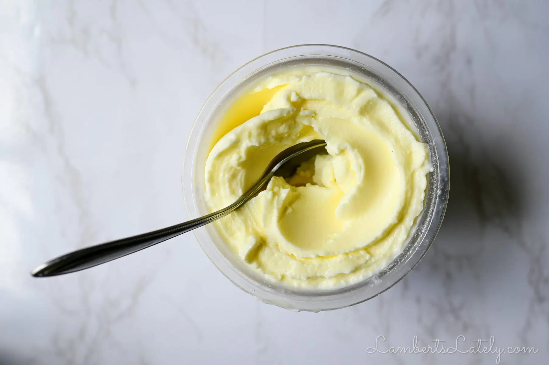 pineapple dole whip in a ninja creami container.