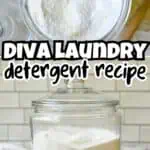 Homemade DIY laundry detergent powder in a glass jar with a scoop on a white surface.