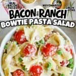 Bacon ranch pasta salad with cherry tomatoes, peas, and cheese in a bowl.