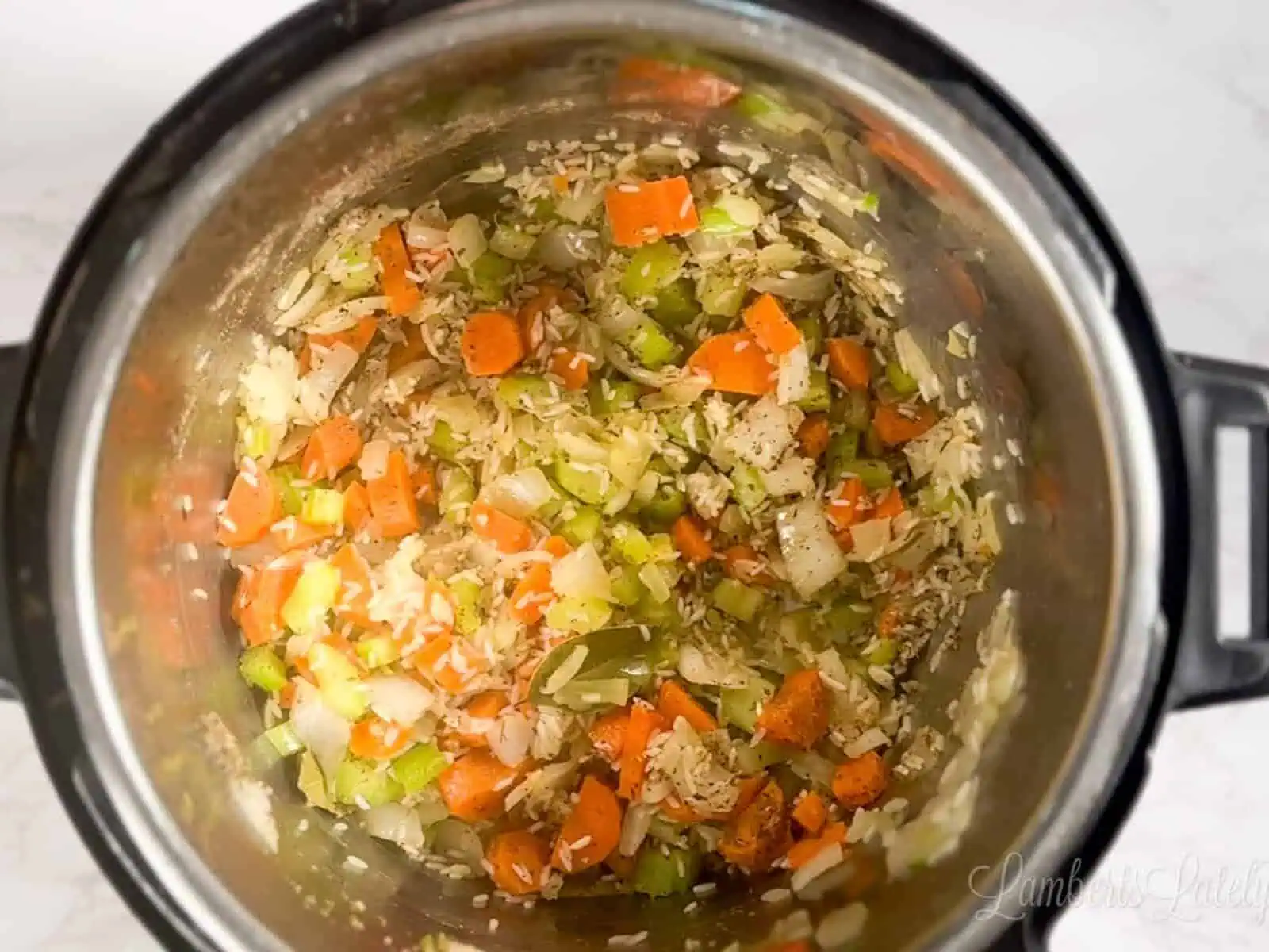 rice, veggies, and seasonings in an instant pot.