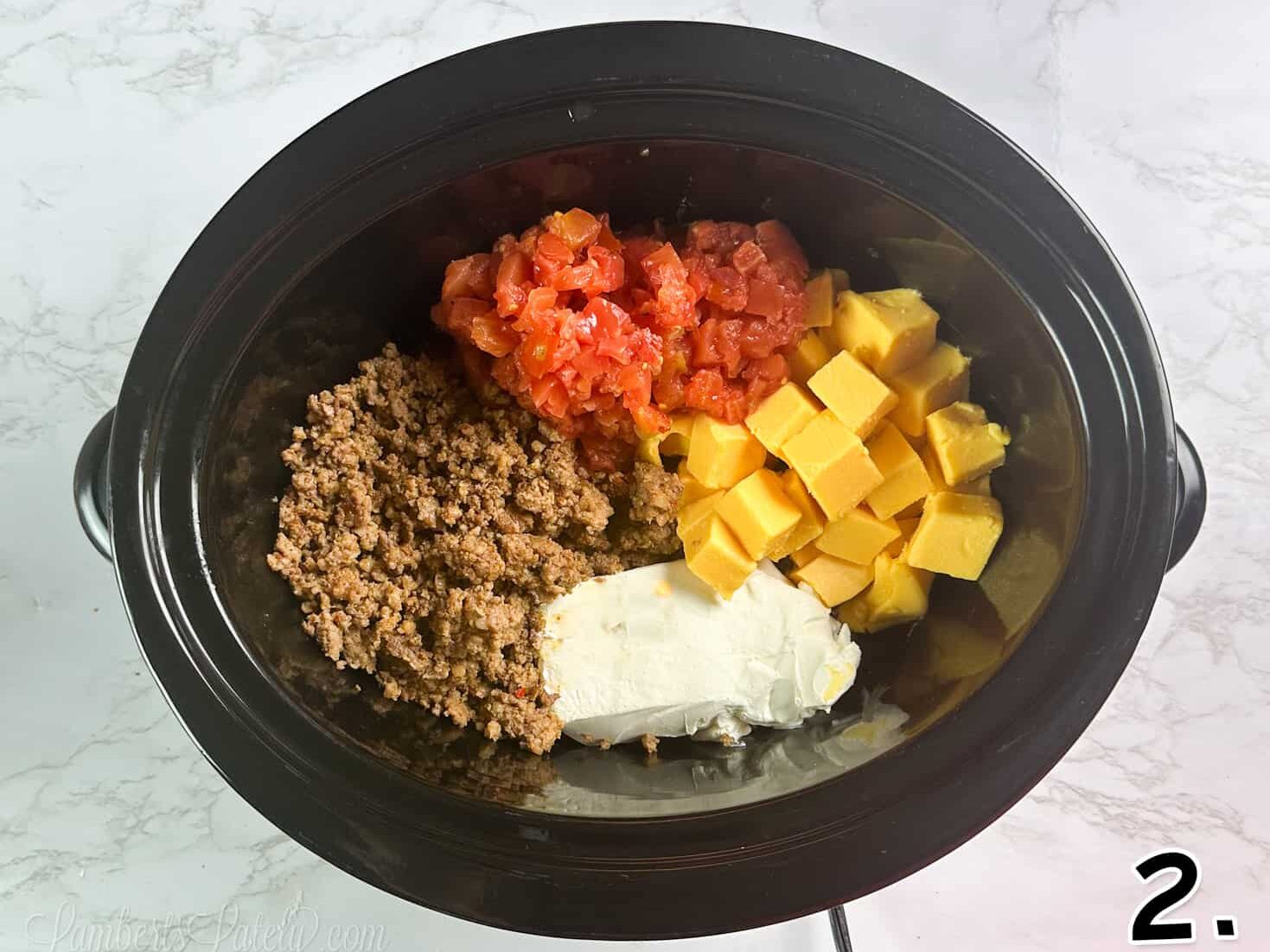 ingredients for rotel dip in a crock pot.