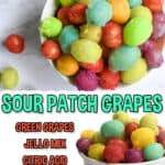 Brightly colored candied sour grapes in a white bowl for a sweet treat.