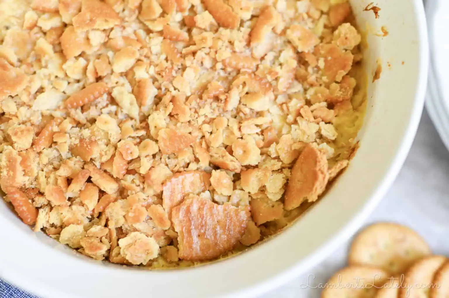 close up of chicken casserole topped with crushed ritz crackers.