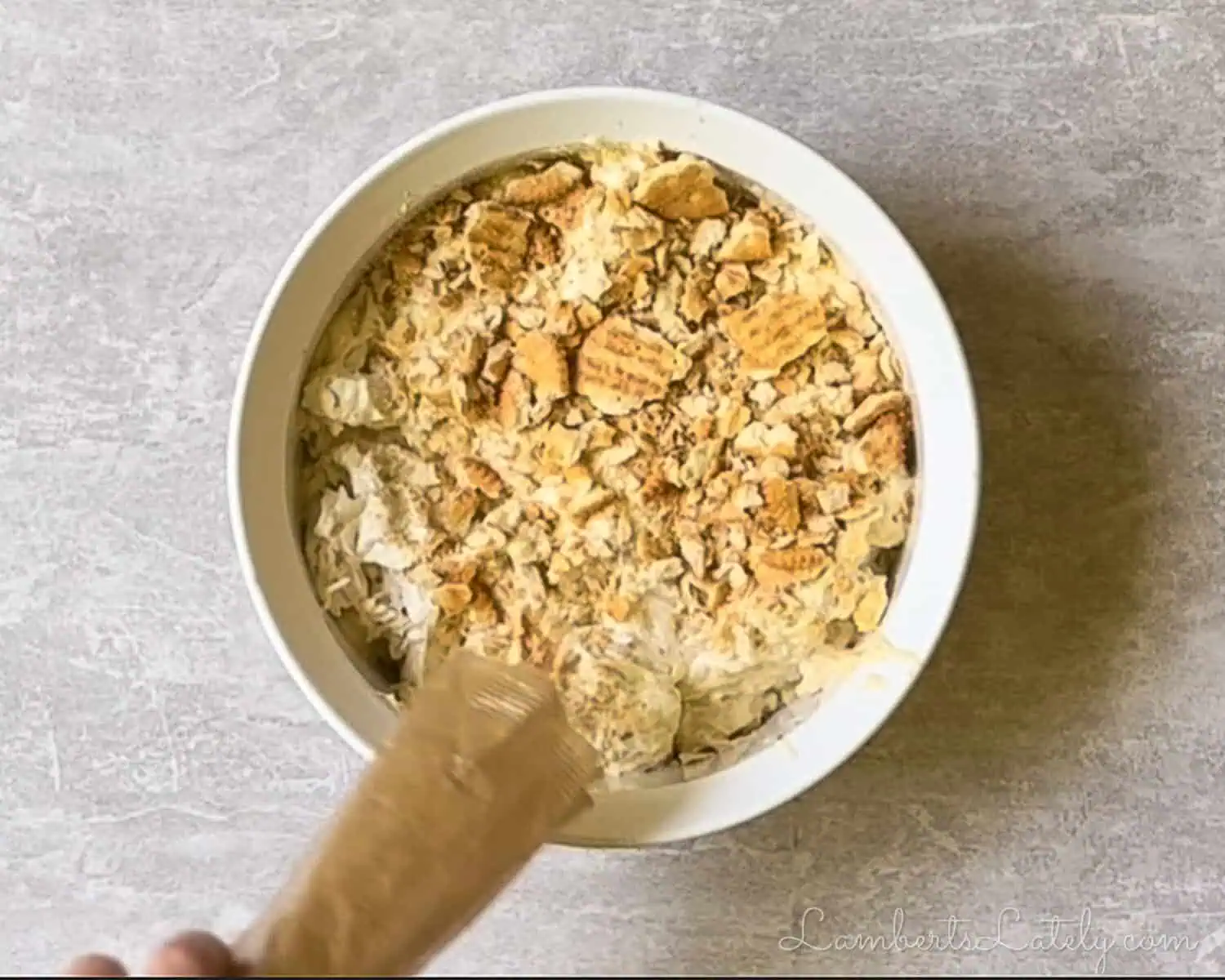 sprinkling crushed ritz crackers over the chicken mixture in the baking dish.