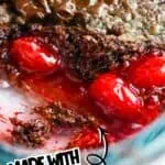 Close-up of Chocolate Cherry Dump Cake with cherry filling and chocolate topping.