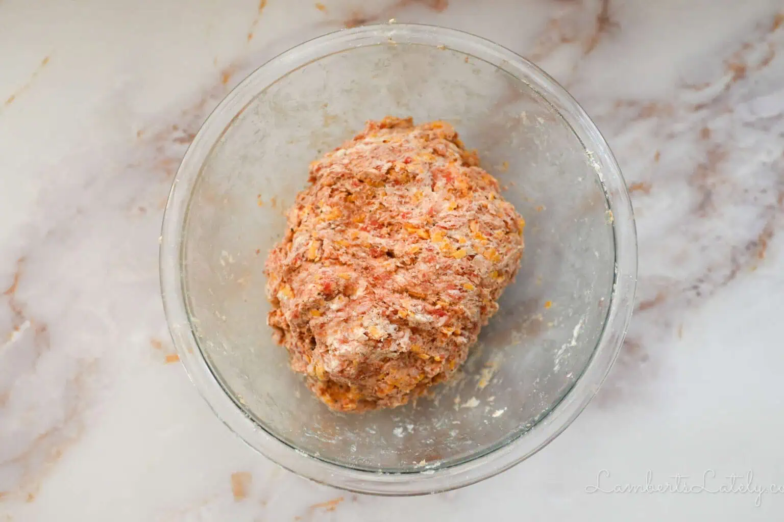 sausage ball dough in a glass bowl.
