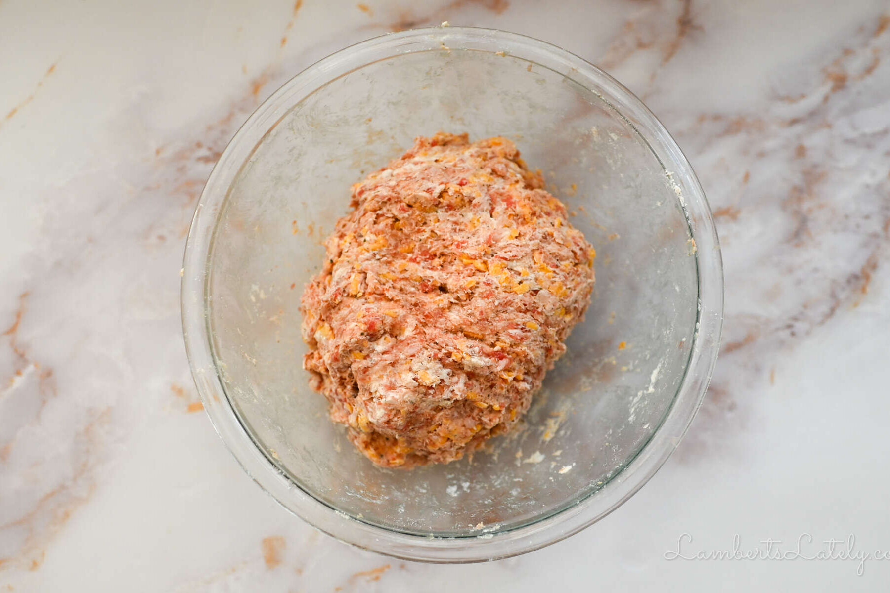 sausage ball dough in a glass bowl.