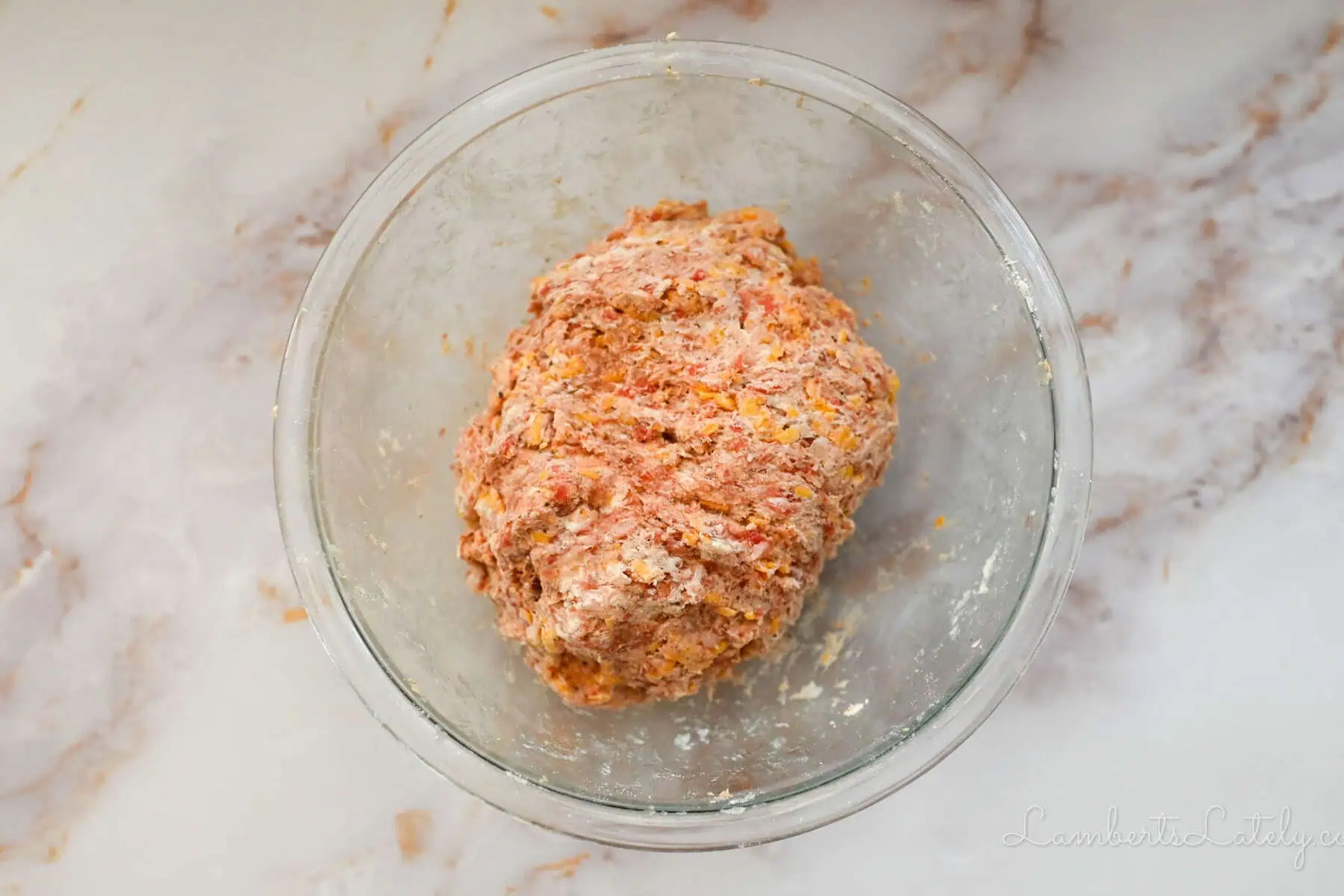 sausage ball dough in a glass bowl.
