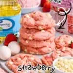 Delicious strawberry cake mix cookies with fresh strawberries and ingredients on a white background.
