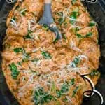 Crock Pot Marry Me Chicken Meatballs with herbs and cheese in a slow cooker.