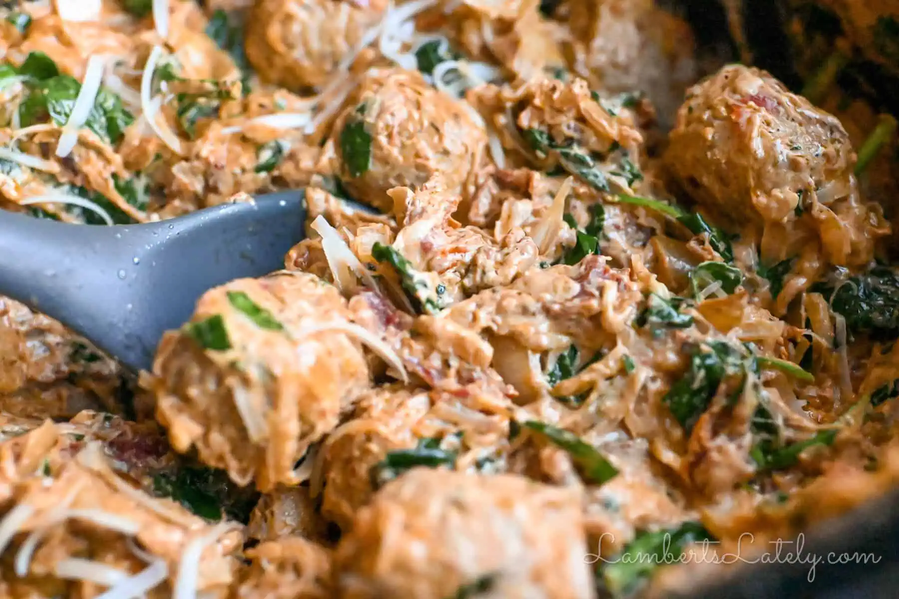 close up of marry me chicken meatballs in a crock pot.