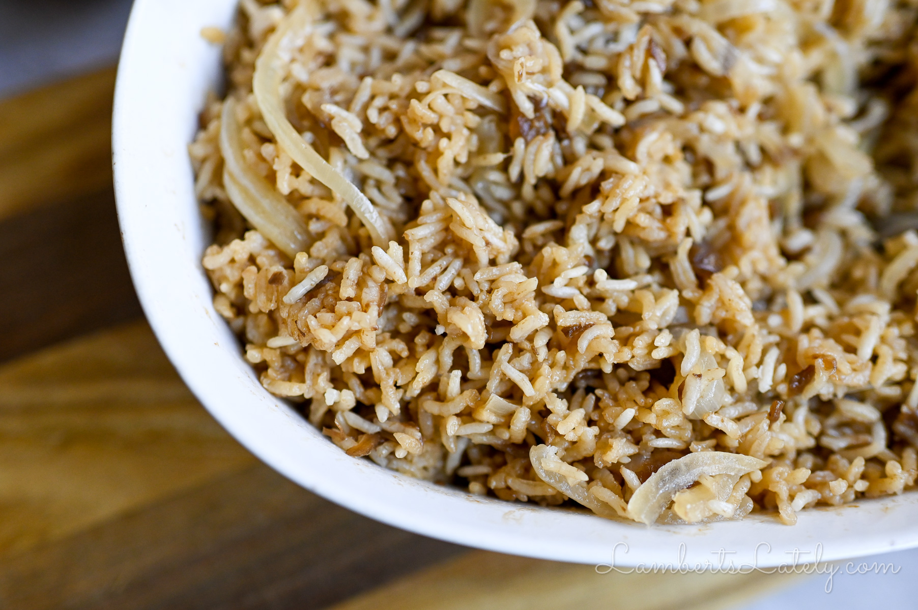 close up of french onion rice in a casserole dish.