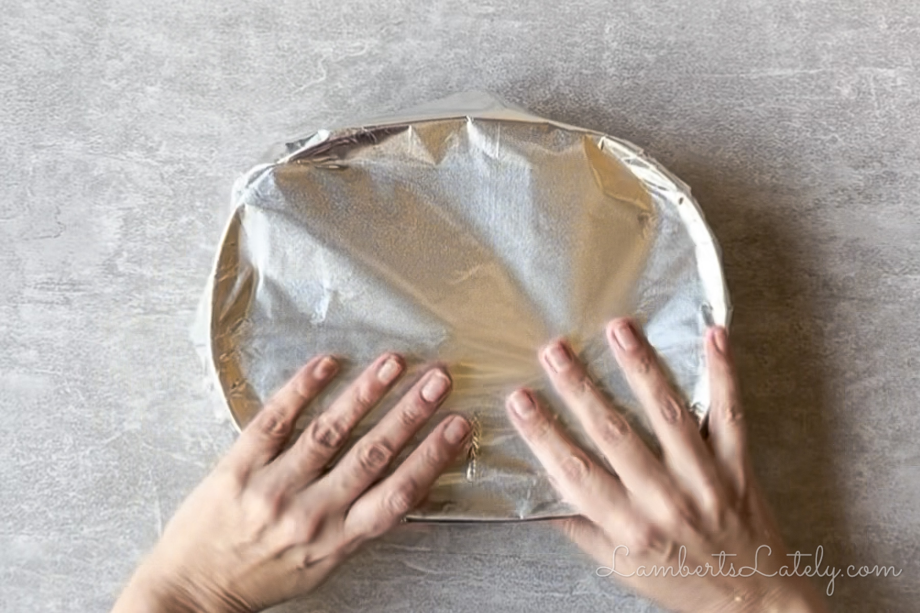 covering the casserole dish with aluminum foil.