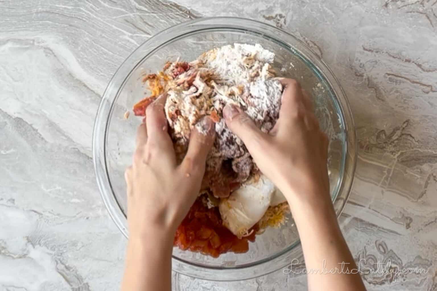 kneading ingredients together.