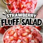 Close-up of strawberry fluff salad with whipped topping and fresh strawberries.