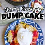 Cherry pineapple dump cake with whipped cream served on blue patterned plates.