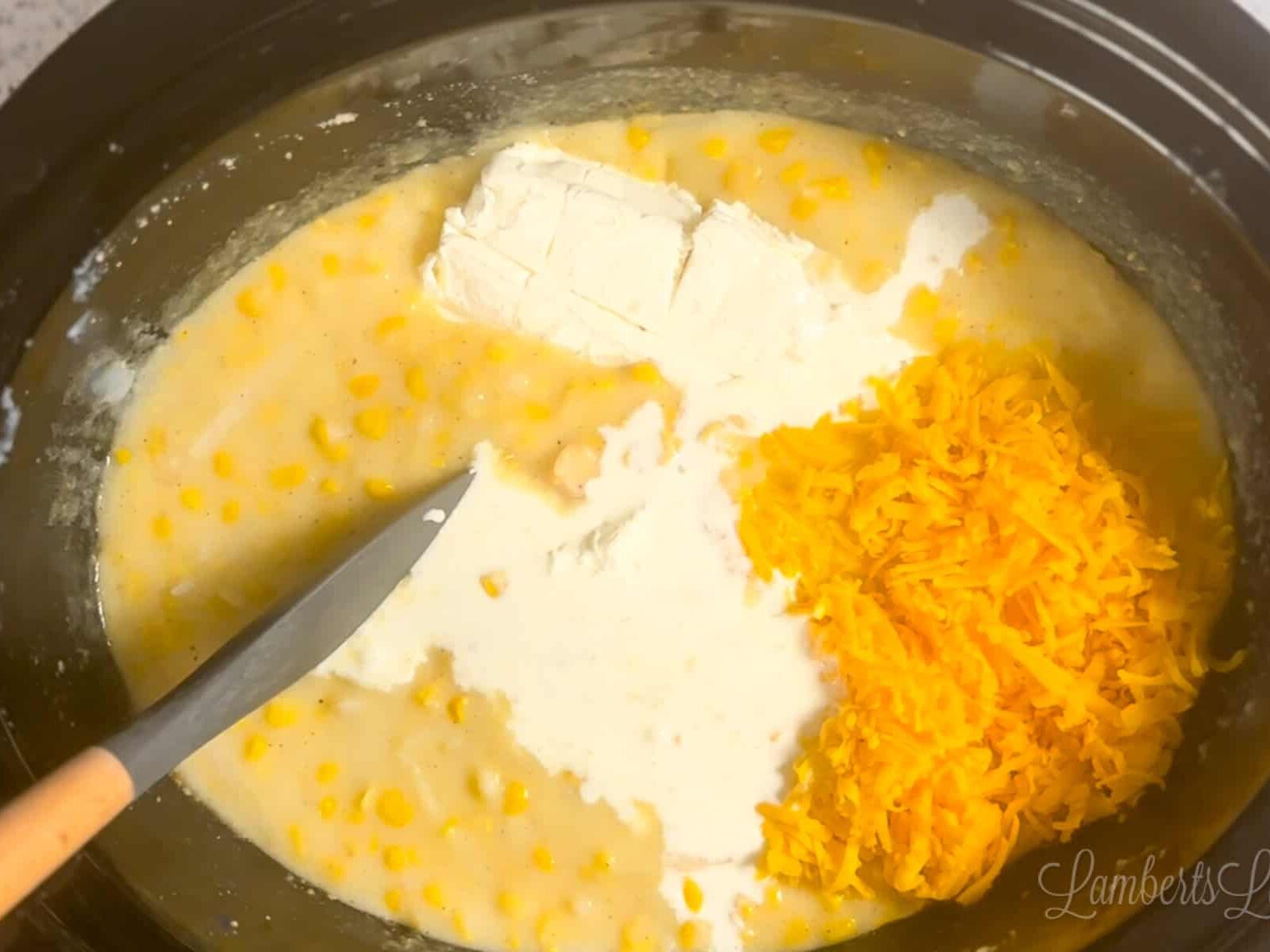 added cheese, cream cheese, and heavy cream to corn chowder.