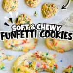 Colorful funfetti cookies with sprinkles on a white surface.