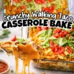 Baked walking taco casserole topped with lettuce, tomatoes, and cheese in a glass dish.