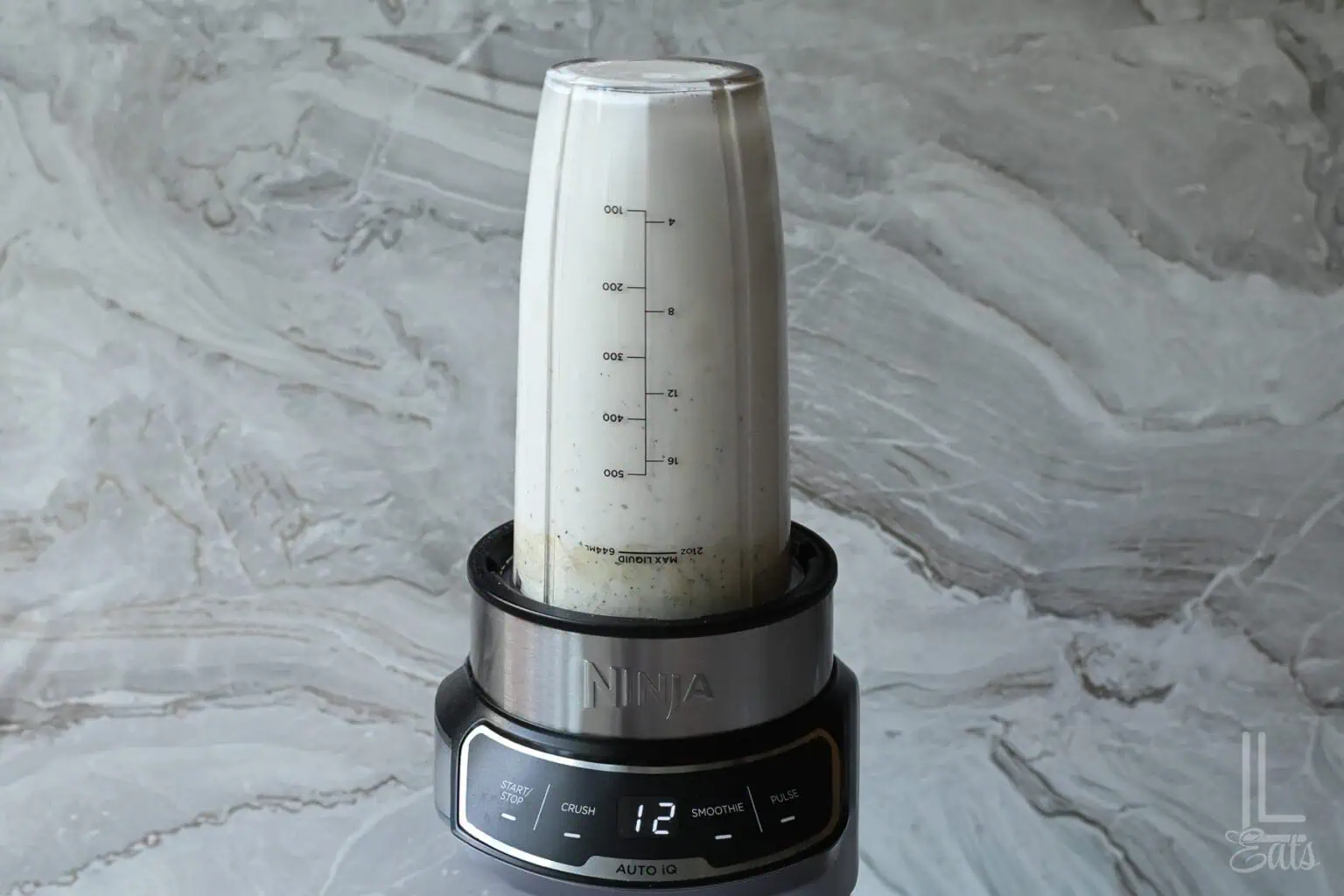 mixing the cottage cheese and ranch in a blender.