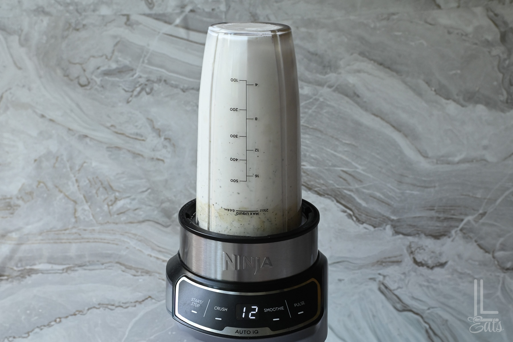 mixing the cottage cheese and ranch in a blender.