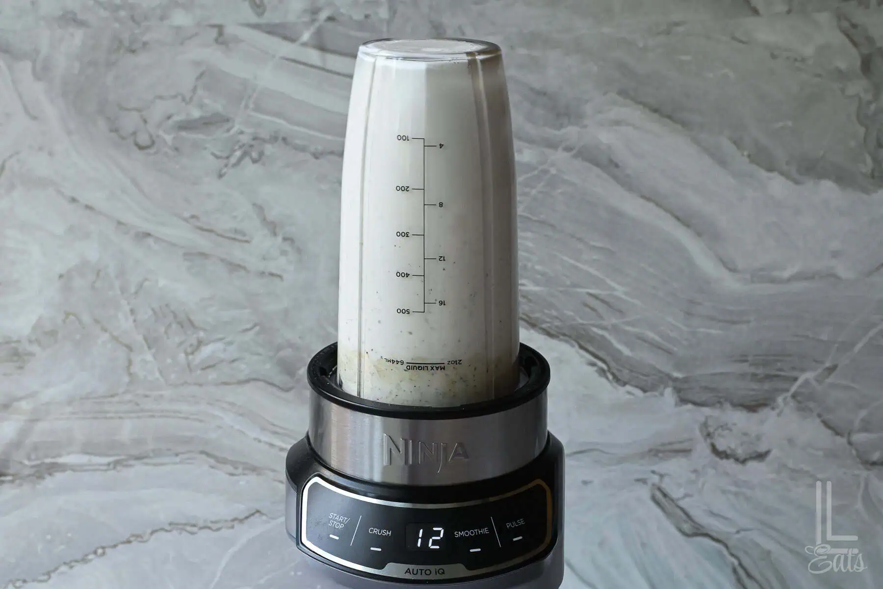 mixing the cottage cheese and ranch in a blender.