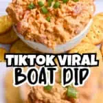 Close-up of a boat-shaped dip with crackers and green onions, TikTok viral boat dip.