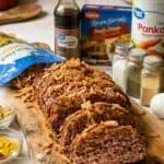 Lamberts Lately Lipton Onion Soup Meatloaf with ingredients on a wooden board.