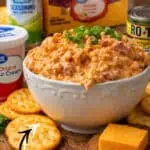 Creamy ranch boat dip served with crackers and cheese for summer snacking.