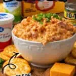 Viral TikTok boat dip recipe perfect for tailgates with cheese, chips, and toppings.