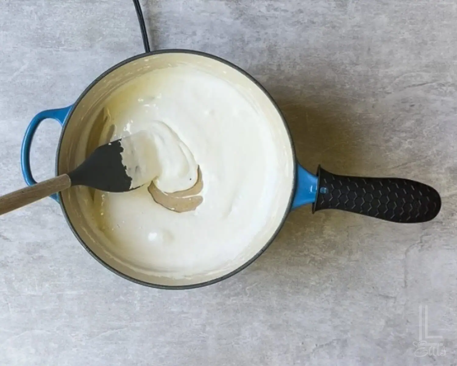 stirring melted marshmallow fluff into the butter.