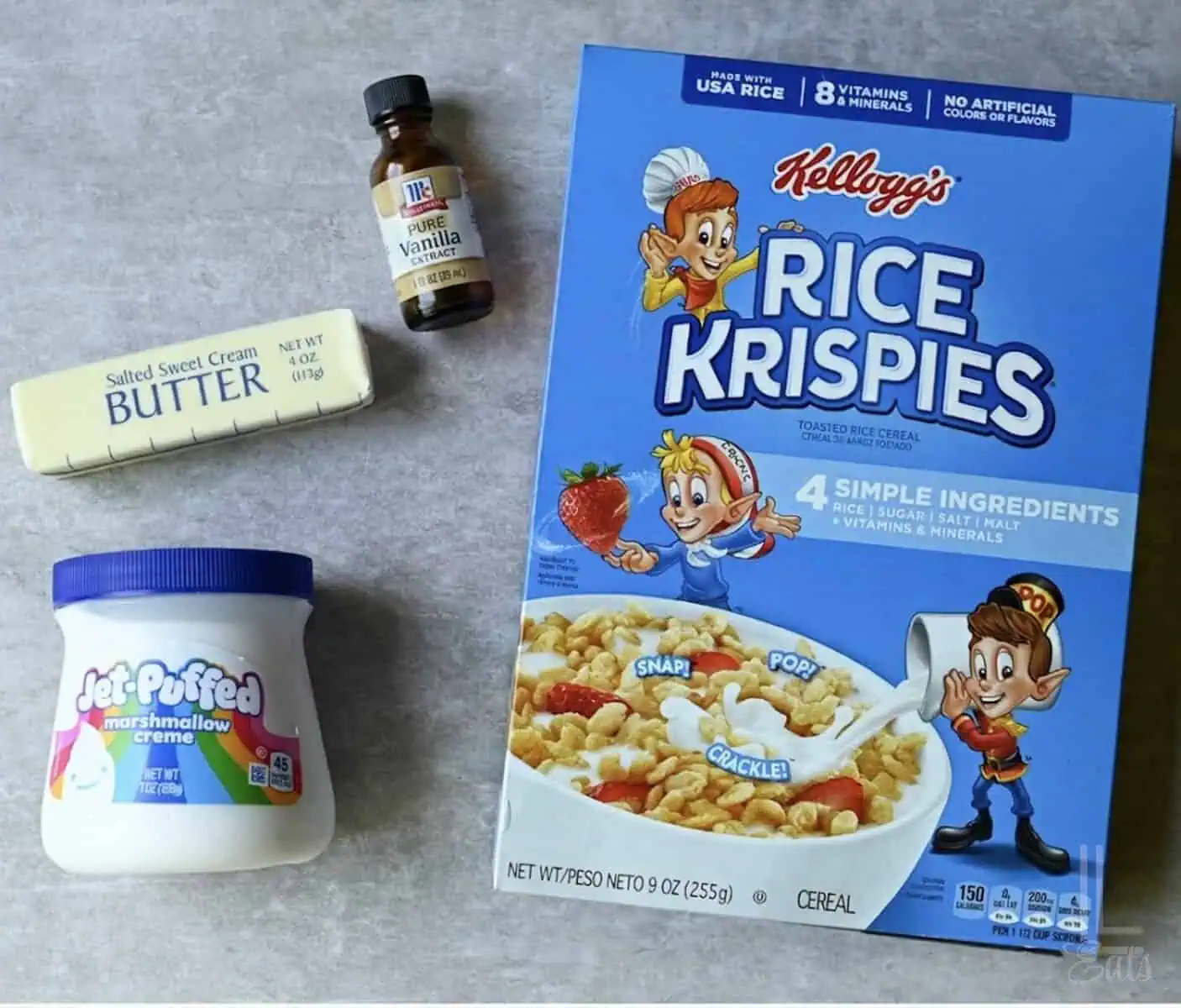 ingredients for rice krispie treats (rice krispies cereal, butter, marshmallow fluff, and vanilla extract).