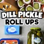 Dill pickle roll ups with cream cheese and ham on a wooden board.