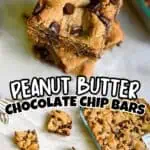 Close-up of peanut butter chocolate chip cookie bars with chunks on top and cut into squares.