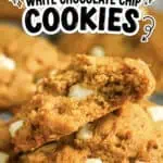 Close-up of white chocolate chip pumpkin cookies with a crispy texture.