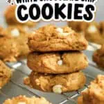 Stack of pumpkin white chocolate chip cookies on cooling rack with text overlay.