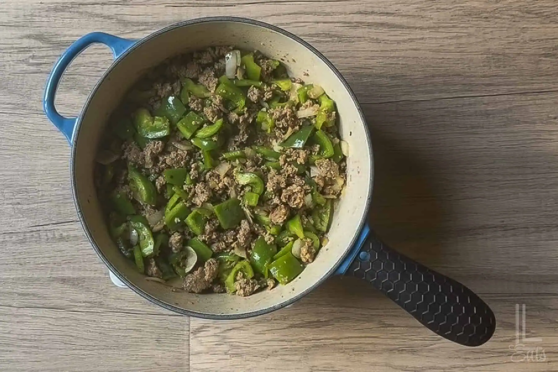 Added green bell peppers and onions to the sausage.