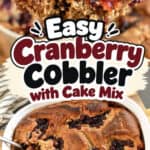 Delicious cranberry cobbler with cake mix topping and fresh berries.
