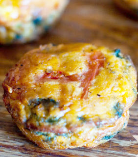 Frittata Cups Recipe - great idea for a quick breakfast meal plan!  Uses eggs, cheese, and veggies/meat in a muffin tin to make a portable, on the go breakfast for kids.