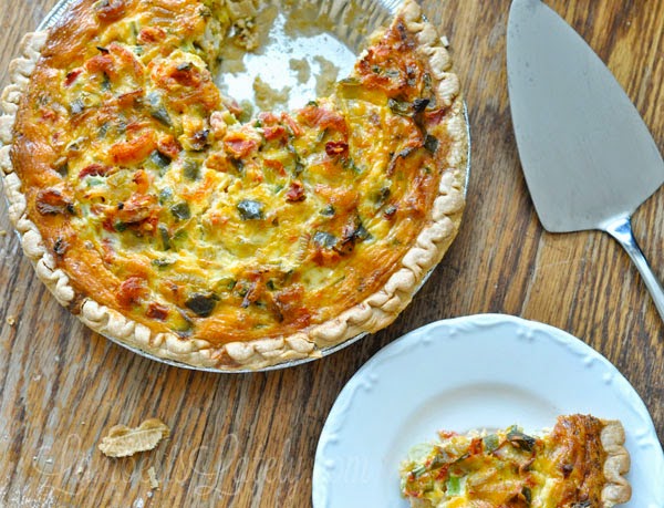 This cajun crawfish quiche recipe is an amazing deep south dish that combines a flaky crust and the spicy flavors of Mardi Gras.  Almost like a pot pie - amazingly delicious!